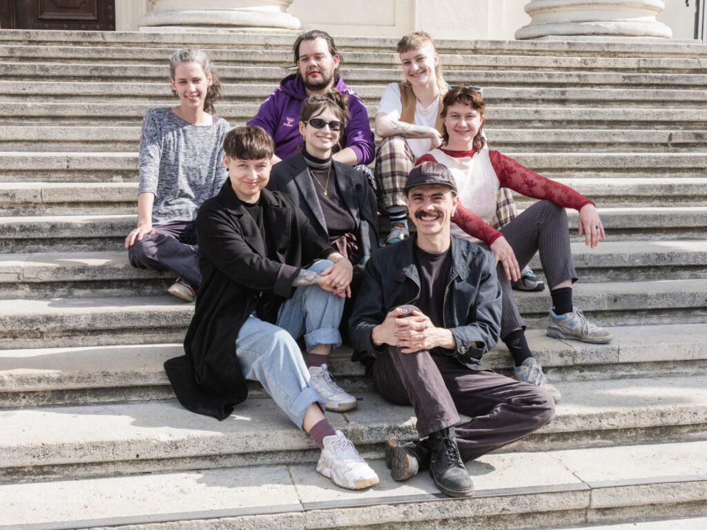 7 members of the AwA* team on the steps of Karlskirche in Vienna.