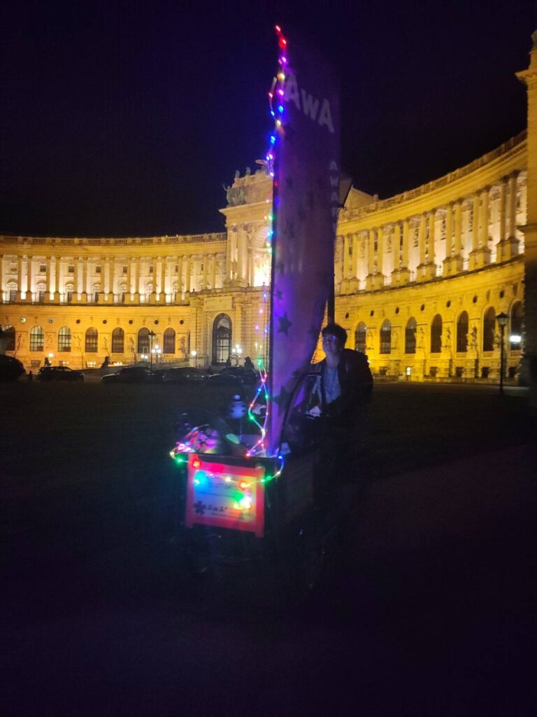 Awareness person on a cargo bike at Heldenplatz in Vienna